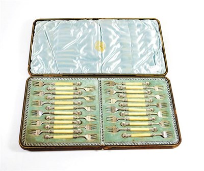 Lot 1492 - {} A Set of Twenty Four Victorian Silver Prawn or Hors d'Oeuvres Forks, Martin Hall & Co, Sheffield