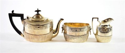 Lot 1501 - {} A Victorian Silver Three Piece Bachelor's Tea Service, maker's mark CF possibly for Charles...