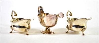 Lot 1502 - {} A Pair of Silver Sauce Boats, Z Barracough & Sons, London 1930, of George III style with gadroon