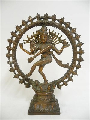 Lot 351 - An Indian Copper Figure of Siva, 19th century, the standing goddess in a circle of flames on a...