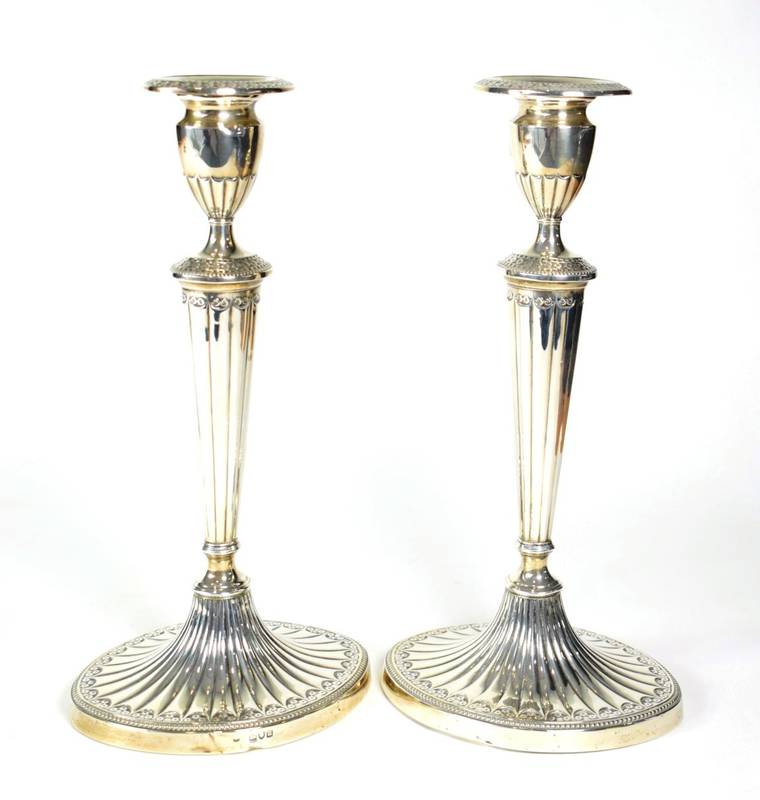 Lot 1530 - A Pair of Late Victorian Silver Candlesticks of George III Style, Thomas Bradbury & Sons,...