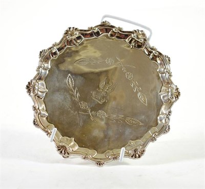 Lot 1546 - ~ An Early George III Silver Salver, Thomas Hannam & Richard Mills, London 1763, shaped...