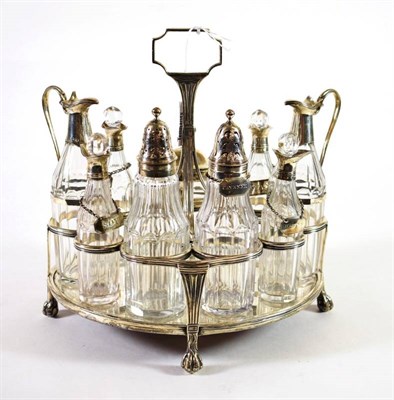 Lot 1572 - A George III Silver Nine Bottle Cruet Stand, Robert & David Hennell, London 1801, oval with...