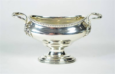 Lot 1588 - A George III Twin Handled Silver Pedestal Sugar Bowl, maker's mark rubbed *E, London 1777, oval...