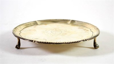 Lot 1599 - A George III Silver Small Salver, John Carter, London 1773, shaped circular with bead border,...