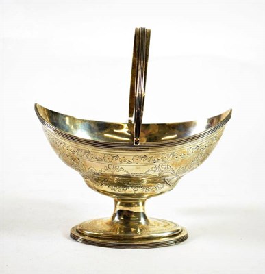 Lot 1600 - A George III Silver Swing Handled Sugar Basket, Peter & Anne Bateman, London 1797, navette shape on