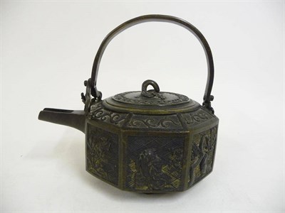 Lot 359 - A Chinese Bronze Octagonal Tea Kettle, 19th century, with fixed arched handle, each of the side...