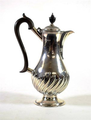 Lot 1617 - A Late Victorian Silver Hot Water Jug, Roberts & Belk, Sheffield 1896, baluster form with...