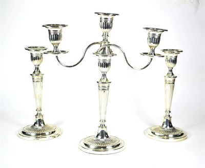 Lot 1628 - A Matched Silver Three Light Candelabrum and Pair of Candlesticks En-Suite, marks of Fordham &...