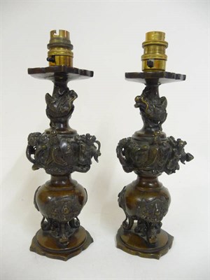 Lot 363 - A Pair of Japanese Bronze Lantern or Candle Stands, late Meiji Period (1868-1912), the knopped stem