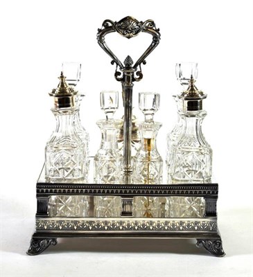 Lot 1648 - A Victorian Elkington Electroplated Seven Bottle Cruet Stand, date code for 1876, rectangular...