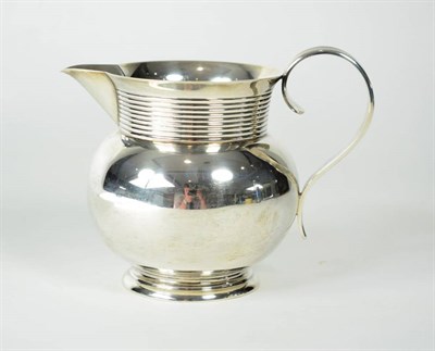 Lot 1649 - A Late Victorian Silver Jug, William Aitken, Chester 1900, with reeded neck and strap handle,...