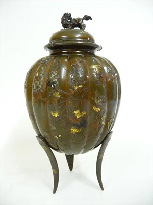 Lot 364 - A Japanese Bronze and Mixed Metal Inlaid Vase and Cover, Meiji Period (1868-1912), of fluted...