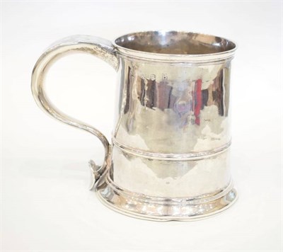 Lot 1661 - A George II Silver Mug, probably Richard Bayley, London 1737, plain tapering with lower girdle, the