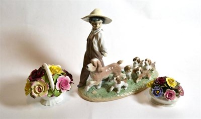 Lot 10 - A Lladro privilege figure group D63NY, of a boy with dog and puppies; and two Aynsley flower...