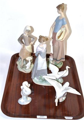 Lot 20 - A group of Lladro porcelain figures and swans