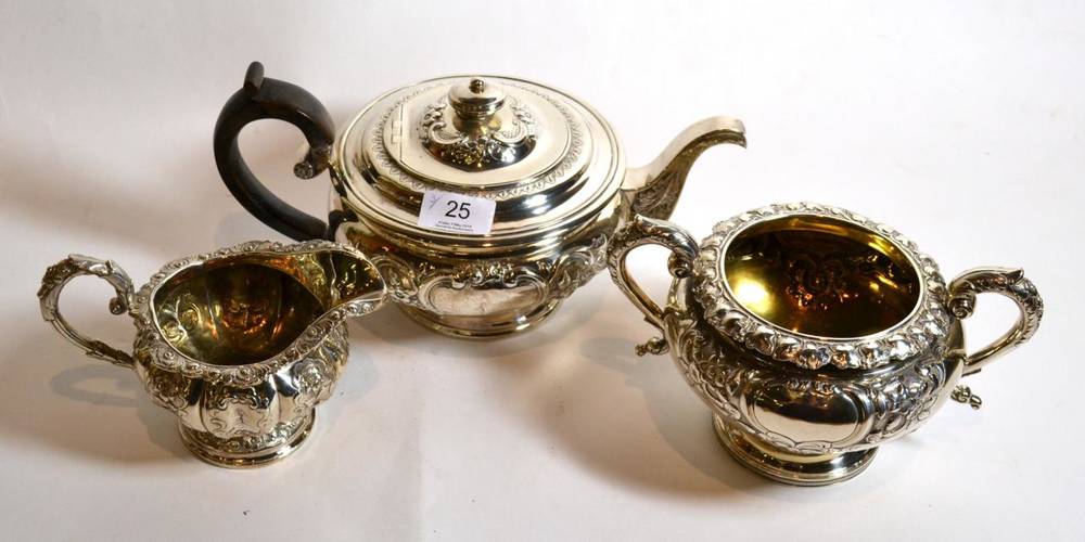 Lot 25 - A matched silver three piece tea service, comprising: teapot, James McKay, Edinburgh 1819; twin...