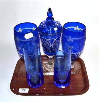 Lot 27 - A pair of blue engraved glass vases; a late Victorian blue glass vase and cover; a pair of blue...