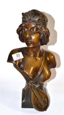Lot 33 - A bronzed spelter bust of a maiden