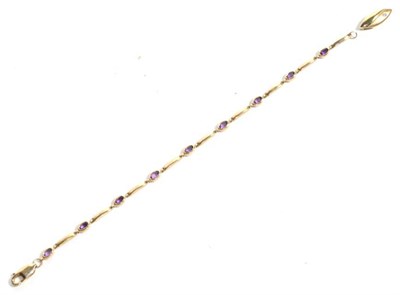 Lot 51 - A gem set bracelet, stamped '9K', length 20cm; and a pendant, stamped '375', length 1.8cm (2)