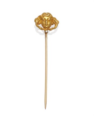 Lot 372 - An Art Nouveau Style Pin, a figure head with flowing locks set with a small diamond on a plain pin