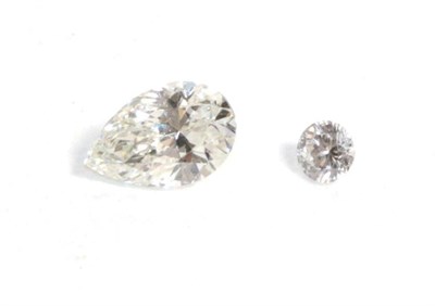 Lot 77 - A loose pear brilliant cut diamond, estimated diamond weight 0.39 carat approximately; and a...
