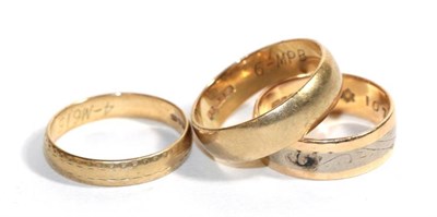 Lot 83 - An 18 carat gold band ring, finger size N; and two 9 carat gold band rings, finger sizes O and...