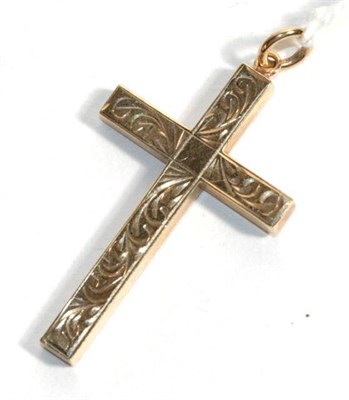 Lot 87 - A 9 carat gold cross pendant, with foliate engraving, measures 2.5cm by 4cm
