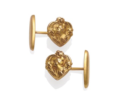 Lot 375 - A Pair of Art Nouveau Cufflinks, heart shaped panels depict a maiden amongst irises, on hinged bars