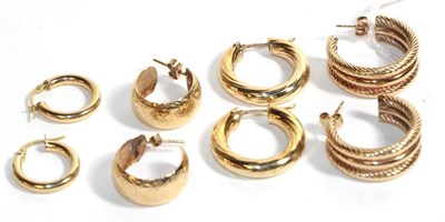 Lot 91 - Three pairs of 9 carat gold hoop earrings, with post fittings; and another pair stamped 'ITALY'...