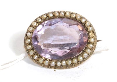 Lot 106 - A seed pearl and gem set oval brooch, unmarked, length 2.5cm