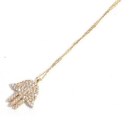 Lot 112 - A diamond set pendant on a chain stamped '750', pendant length 1.6cm, chain length 42cm