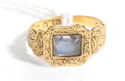 Lot 119 - An 18 carat gold moonstone mourning ring, finger size J