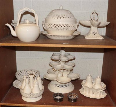 Lot 184 - A collection of Royal Creamware including a table centrepiece with stylised dolphin supports...