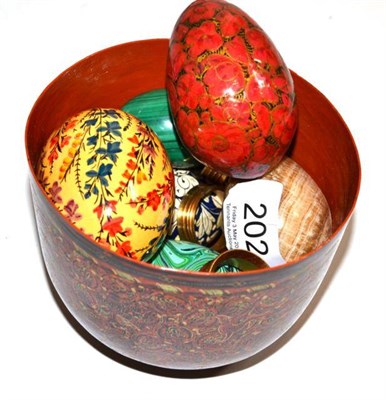 Lot 202 - A group of hard stone and papier mache eggs and stands