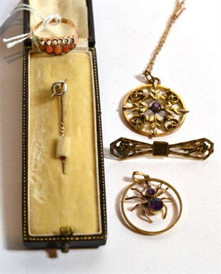 Lot 203 - A 9 carat gold five stone coral ring, finger size N; an amethyst spider pendant stamped '9CT';...