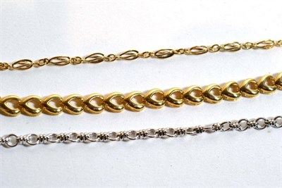 Lot 218 - A 9 carat gold fancy link bracelet, length 20cm; a yellow metal fancy link bracelet, stamped '375'