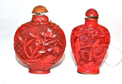 Lot 229 - A Chinese cinnabar lacquer snuff bottle and stopper, of flattened baluster form carved with figures