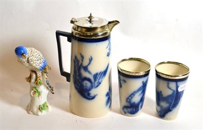 Lot 253 - Victorian blue and white pottery jug with plated mount and two beakers; together with a model...