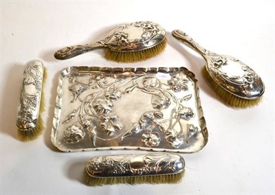 Lot 258 - A silver dressing table tray, Comyns, London; and two pairs of similar brushes also by Comyns