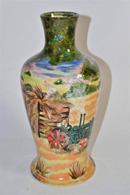 Lot 279 - A Cobridge pottery vase 'Wartime Harvest' by Angie Davenport, impressed and painted marks, 32cm...