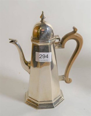 Lot 294 - An octagonal silver coffee pot of Queen Anne style, Thomas Bradbury, London 1900, of plain tapering