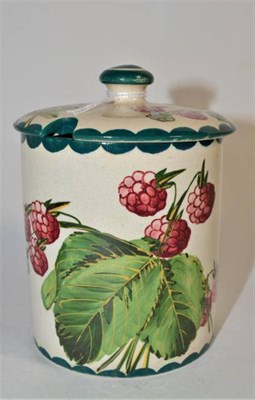 Lot 299 - A Wemyss pottery condiment jar and cover decorated with raspberries manufactured for T Goode &...