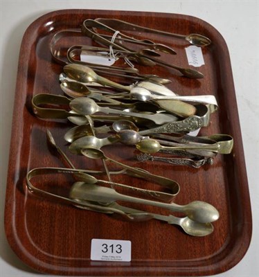 Lot 313 - A quantity of silver and plated sugar nips together with a set of five Georgian silver tea spoons