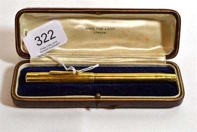 Lot 322 - An 18ct gold swan fountain pen, Mabie, Todd & Co, London 1938, the nib marked ''Swan 2 14ct'',...