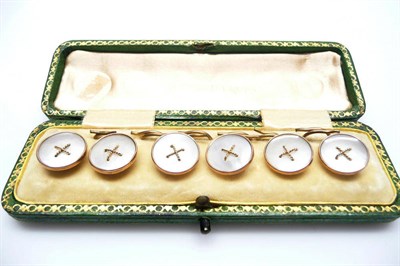 Lot 400 - A Set of Six Mother-of-Pearl Dress Studs, the round mother-of-pearl disks within a rose gold...