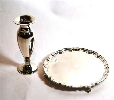 Lot 367 - A silver salver with piecrust border, Sheffield; and a loaded silver vase, Birmingham