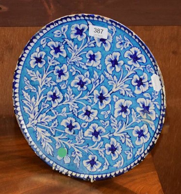 Lot 387 - An Isnik style faience plate (af)