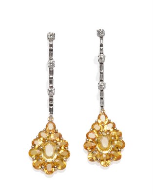 Lot 414 - A Pair of 18 Carat White Gold Yellow Sapphire and Diamond Drop Earrings, a string of round...