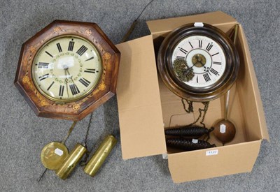 Lot 1122 - An inlaid 19th century wall timepiece and a ''Postmans'' alarm wall timepiece (2)
